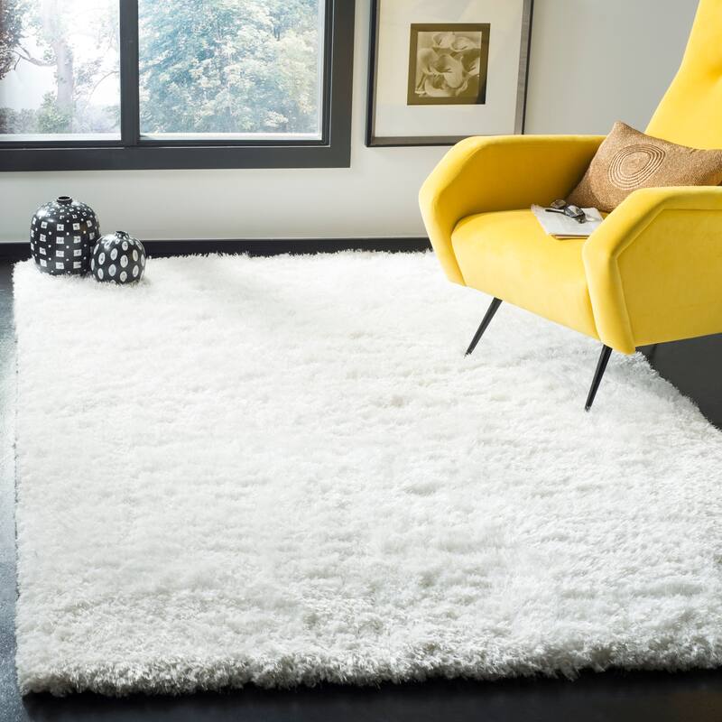 SAFAVIEH Handmade Toronto Shag Joana Polyester Rug - 4' x 6' - Ivory