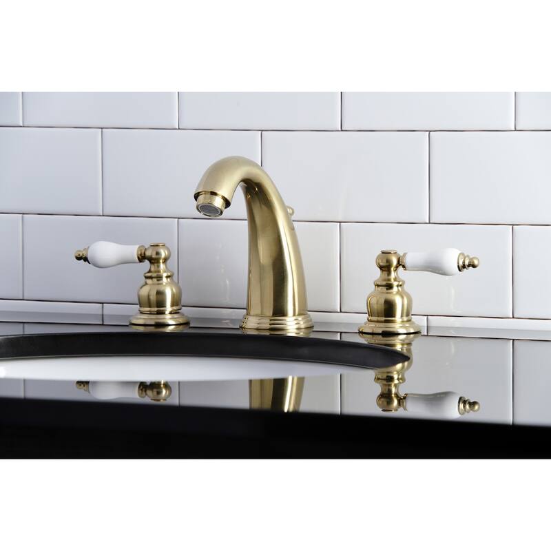 Kingston Brass Victorian Deck Mount Widespread Bathroom Faucet