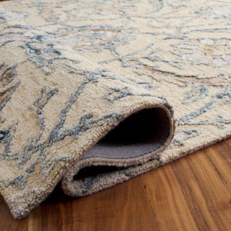 SAFAVIEH Handmade Metro Medrea Wool Rug