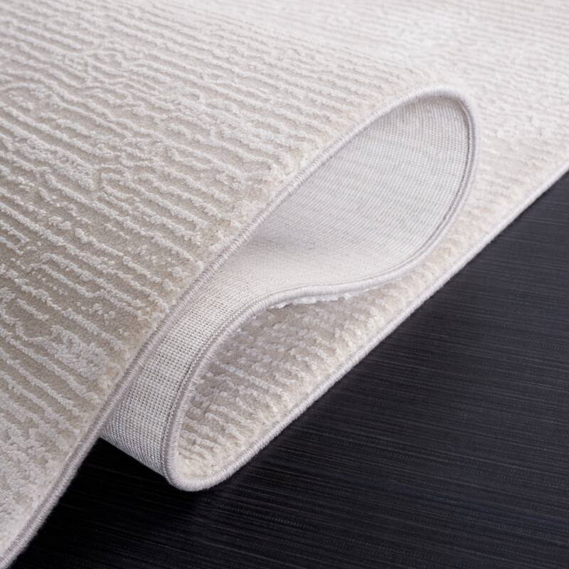 SAFAVIEH Diamond Kiki Modern Abstract Fringe Rug