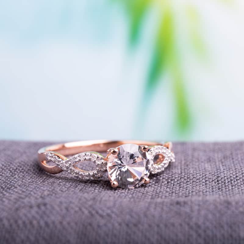 Miadora 10k Rose Gold Created White Sapphire 1/10ct TDW Diamond Infinity Engagement Ring