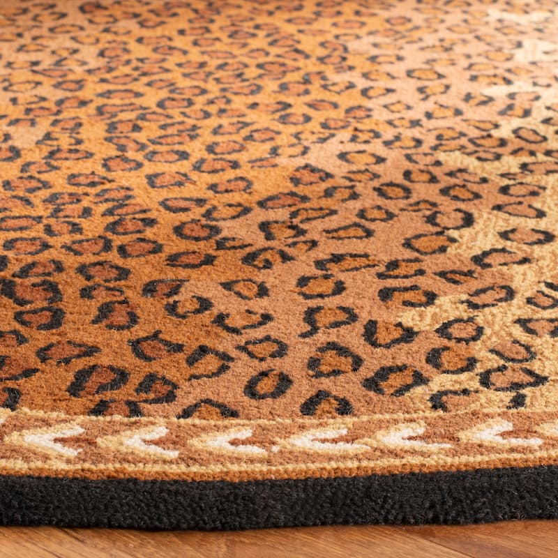 SAFAVIEH Handmade Chelsea Solar Garden Leopard French Country Wool Rug - 4'6" x 6'6" Oval - Black/Brown