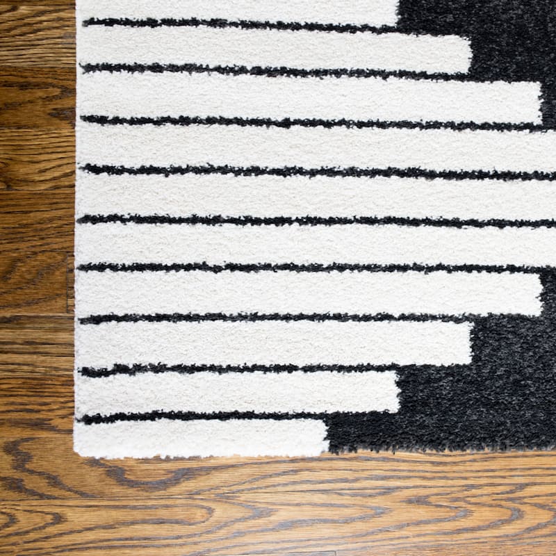 Carson Carrington Salsaker Geometric Area Rug
