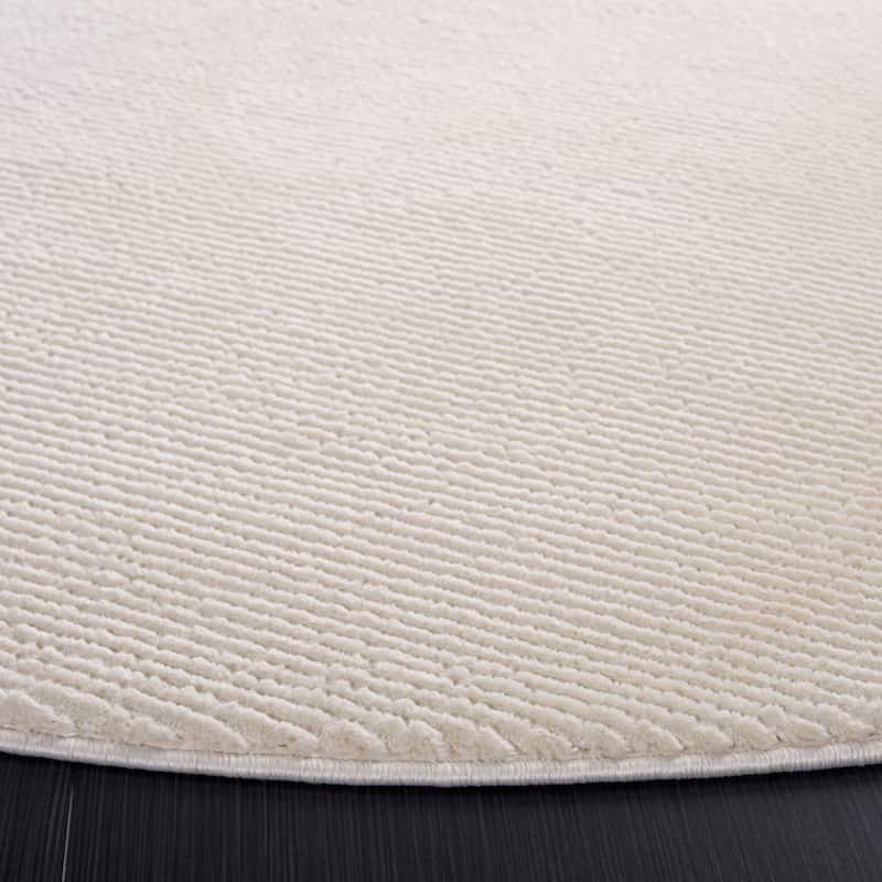 SAFAVIEH Revive Avie Solid Rug