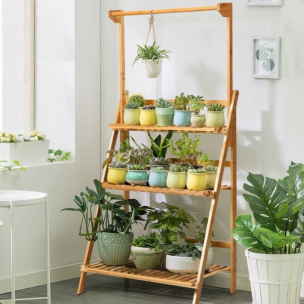 https://ak1.ostkcdn.com/images/products/is/images/direct/2a5fb5673f92645e7823f3e45a7834052cae13b8/Costway-3-Tier-Bamboo-Hanging-Folding-Plant-Shelf-Stand-Flower-Pot-Display-Rack-Bookcase.jpg?impolicy=medium