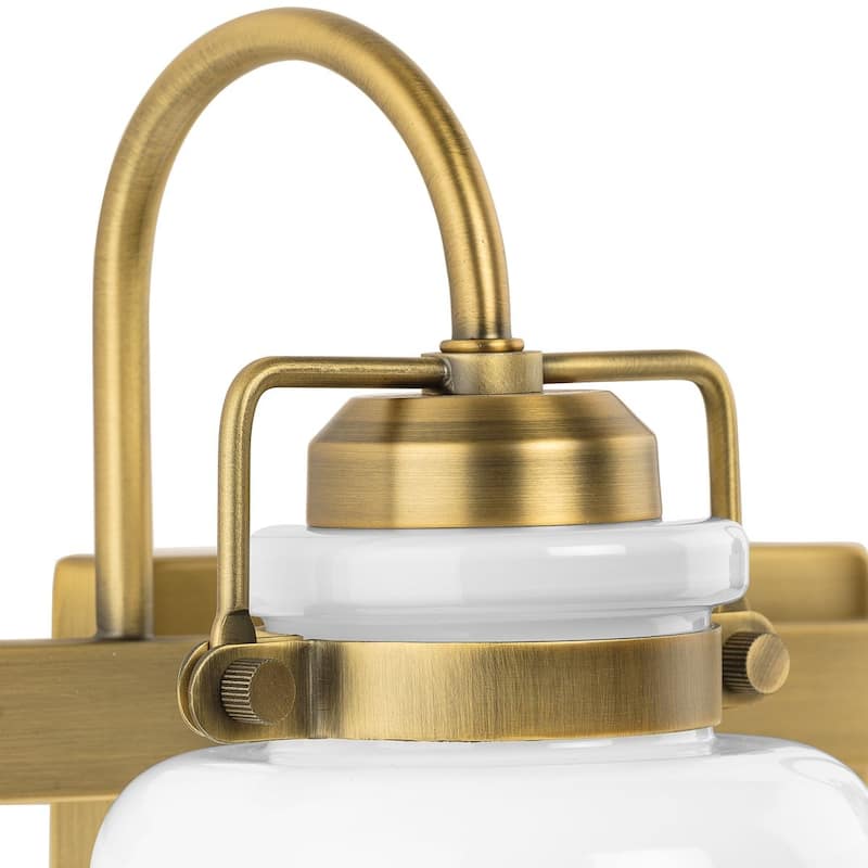 Fessler Collection Two-Light Vintage Brass Opal Glass Farmhouse Bath Light - 13 in x 7.12 in x 9.12 in