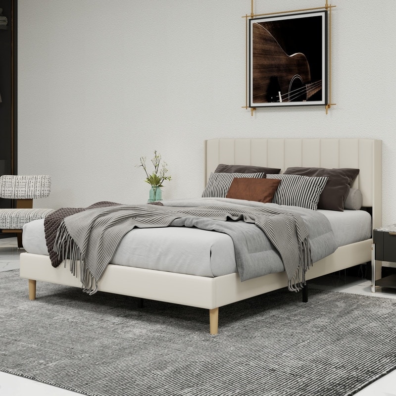 Caxkun Upholstered Platform Bed Frame with Wingback headboard.