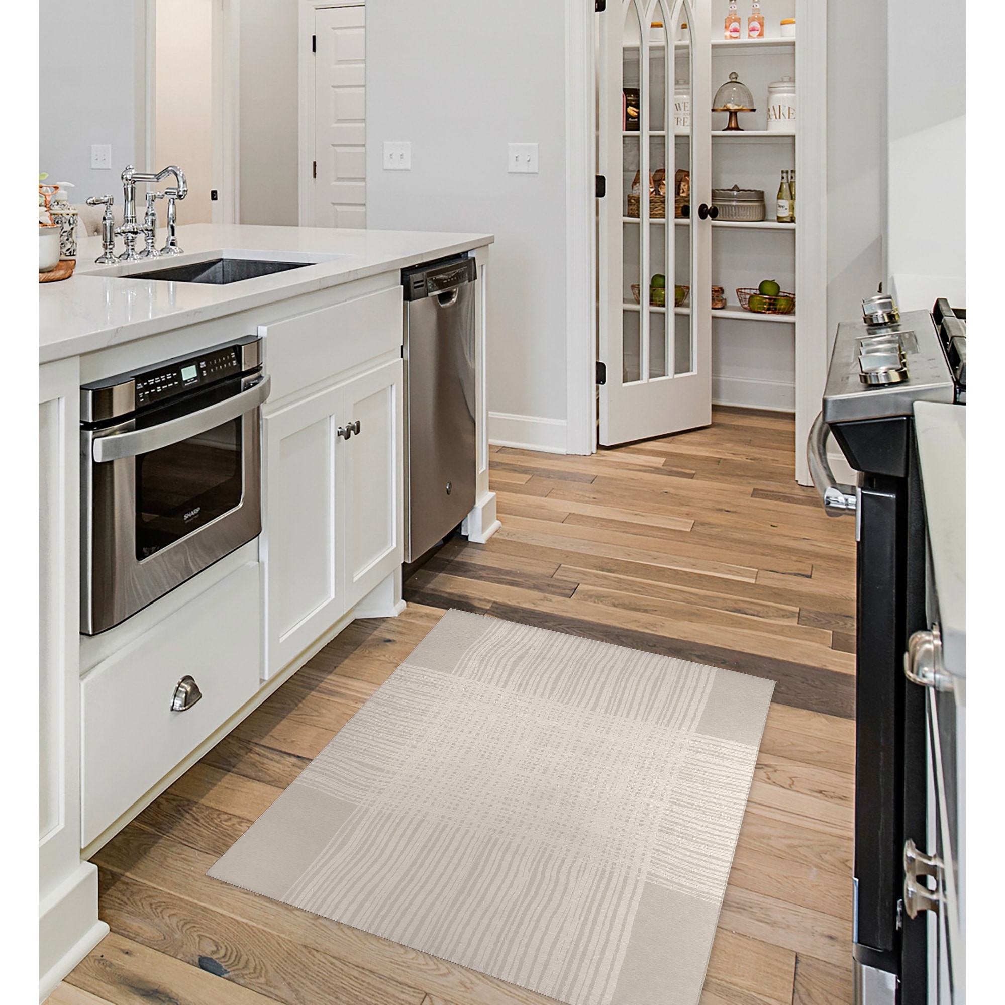 https://ak1.ostkcdn.com/images/products/is/images/direct/2a92380df747292fb01860f8ddbce15e6b7c8f24/PLUS-IVORY-Kitchen-Mat-By-Kavka-Designs.jpg