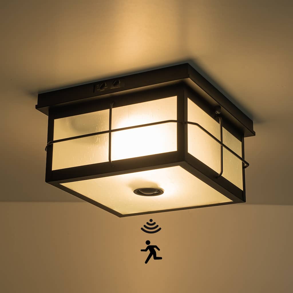 Flush mount motion sensor outdoor ceiling light with frosted glass - black
