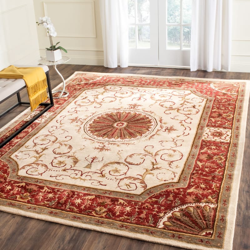 SAFAVIEH Handmade Empire Eftichia Traditional Oriental Wool Rug - 7'6" x 9'6" - Ivory/Red