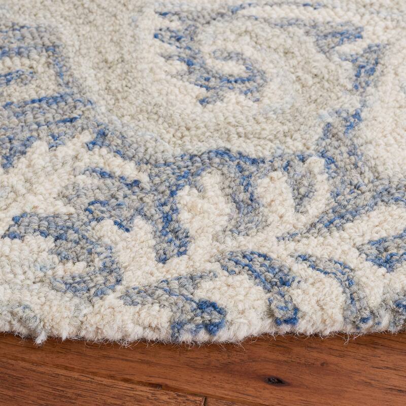 SAFAVIEH Handmade Micro-Loop Doinita Modern Wool Rug
