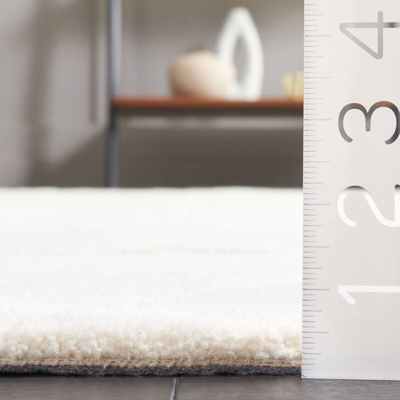SAFAVIEH Handmade Ebony Vaida Modern Wool Rug