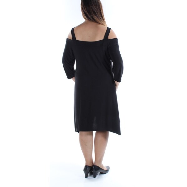 black trapeze cocktail dress