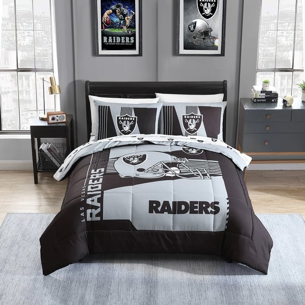 https://ak1.ostkcdn.com/images/products/is/images/direct/2b343540b9526666f8a01720eb4f0831e2320d1a/Las-Vegas-Raiders-NFL-Licensed-%22Status%22-Bed-In-A-Bag-Comforter-%26-Sheet-Set.jpg?impolicy=medium