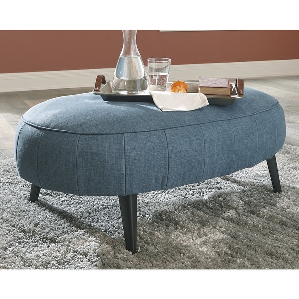 oval upholstered coffee table