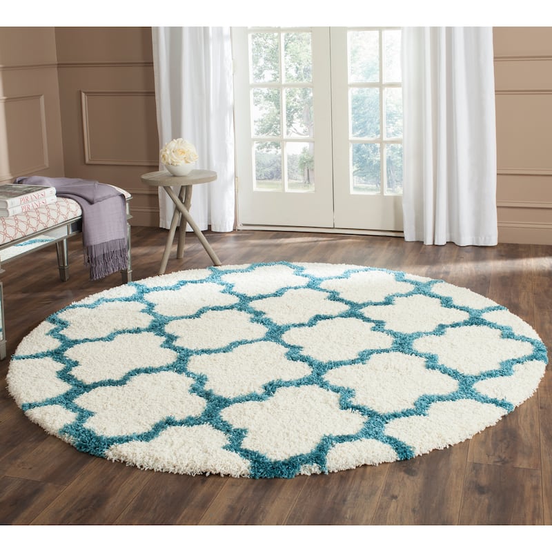 SAFAVIEH Kids Shag Judyth Nursery Playroom 2-inch Thick Rug - 6'7" Round - Ivory/Blue