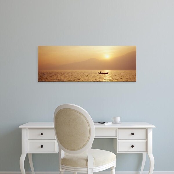 Easy Art Prints Panoramic Images's 'Silhouette of a fishing boat in a lake at sunrise, Lake Garda, Italy' Canvas Art