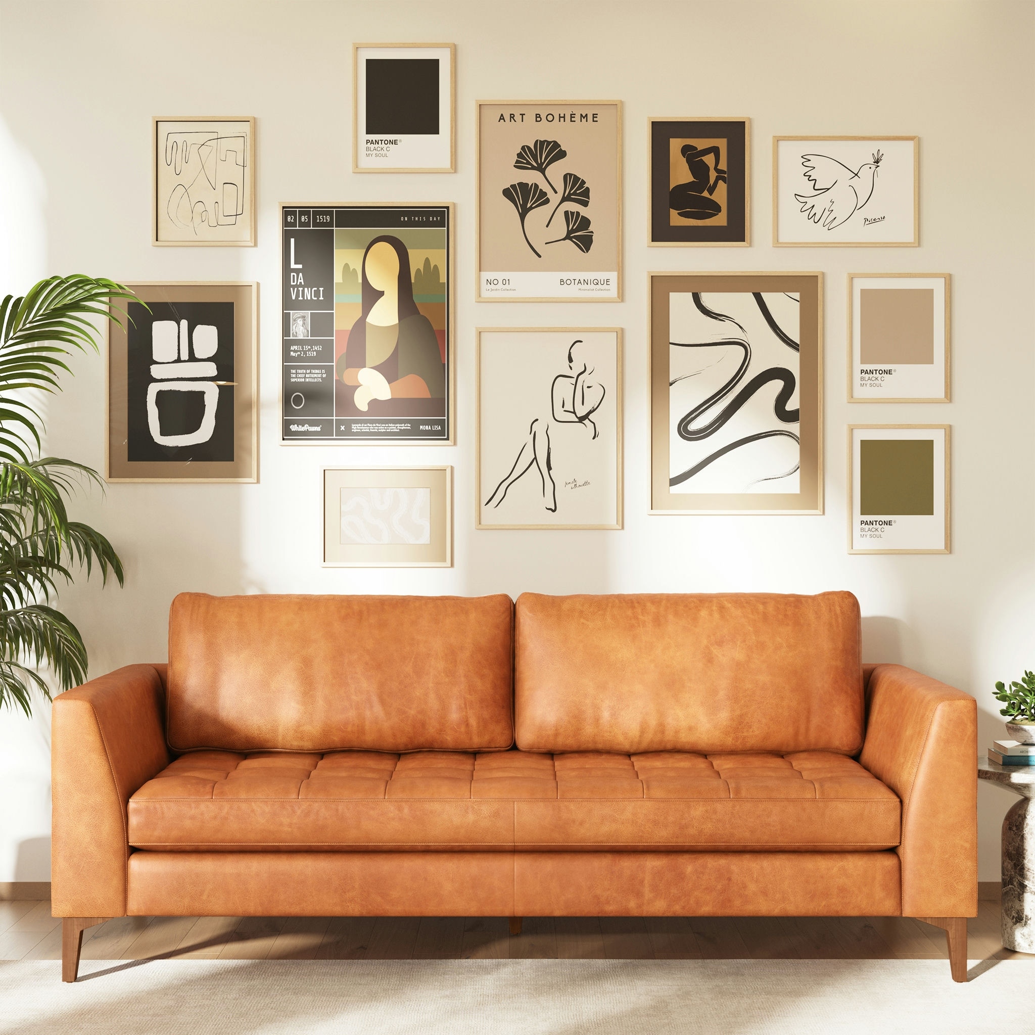 A tan leather sofa with metal legs and gold finish, three-seat, modern design