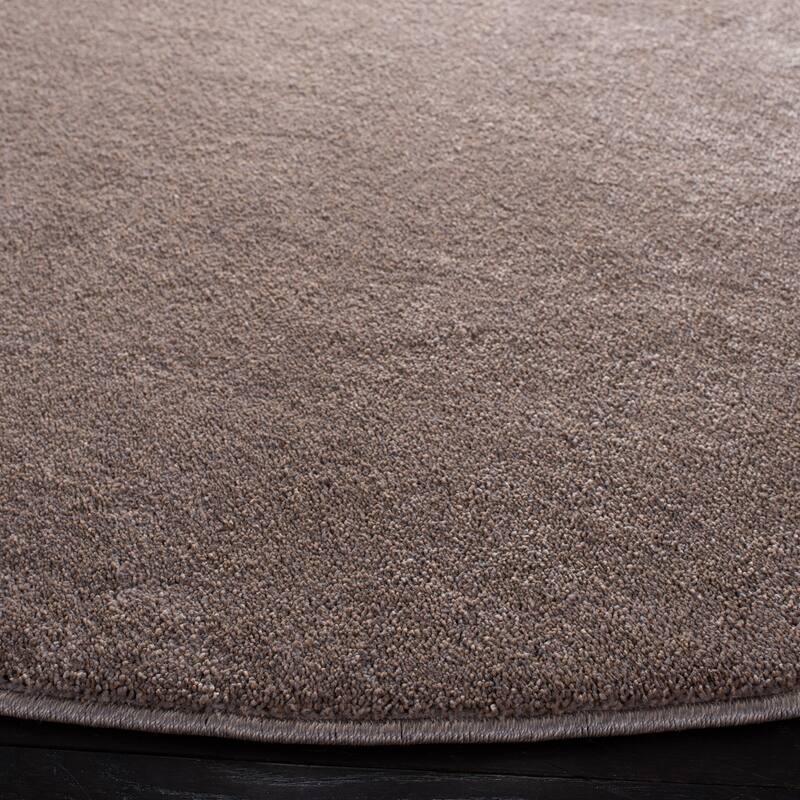 SAFAVIEH, Nonskid Gunde Solid Rug
