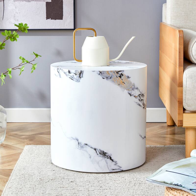 The cylindrical table with its patterned design can be easily integrated into a variety of interior styles, small dining tables