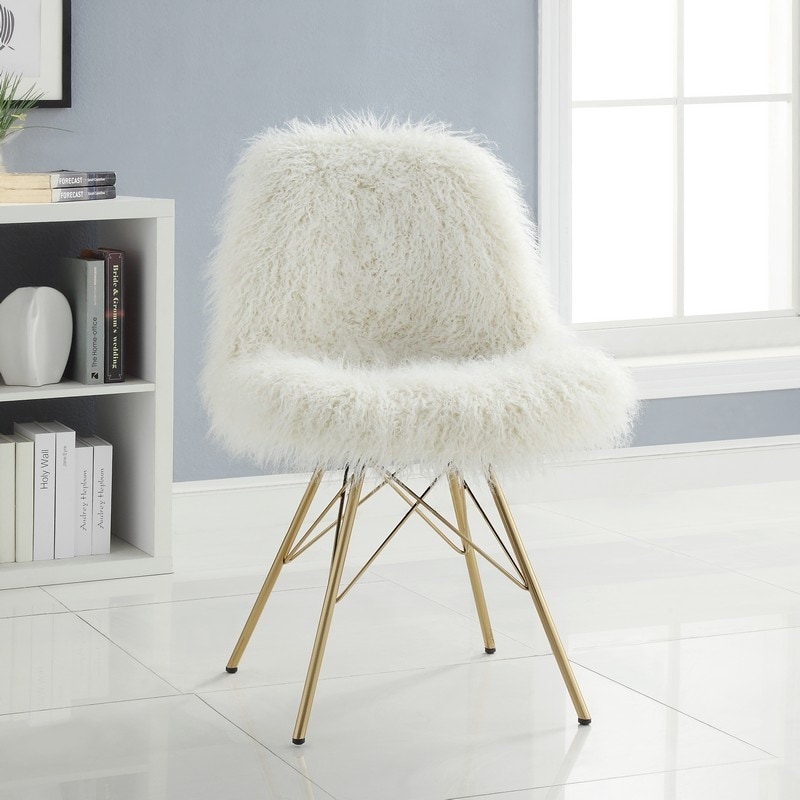white fur chair with gold legs