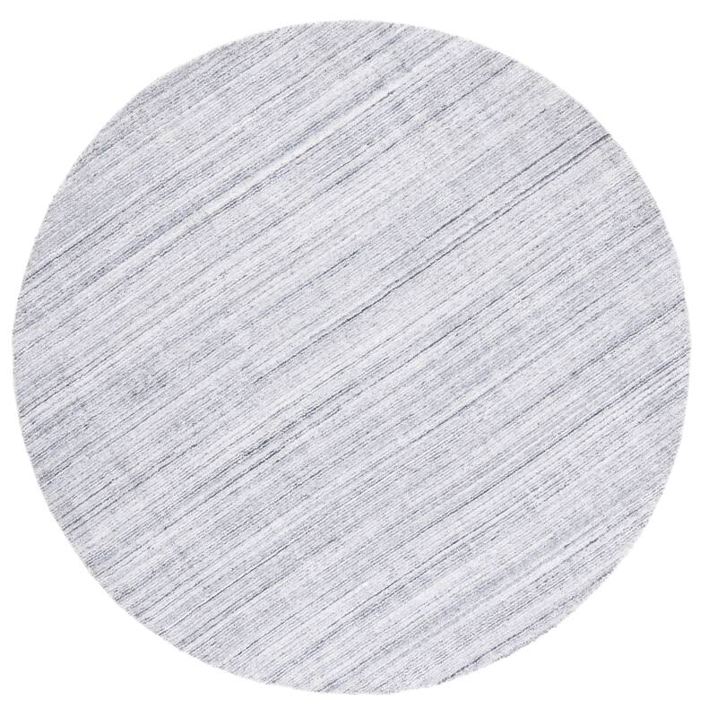 SAFAVIEH Handmade Mirage Tybritt Modern Wool/ Viscose Rug
