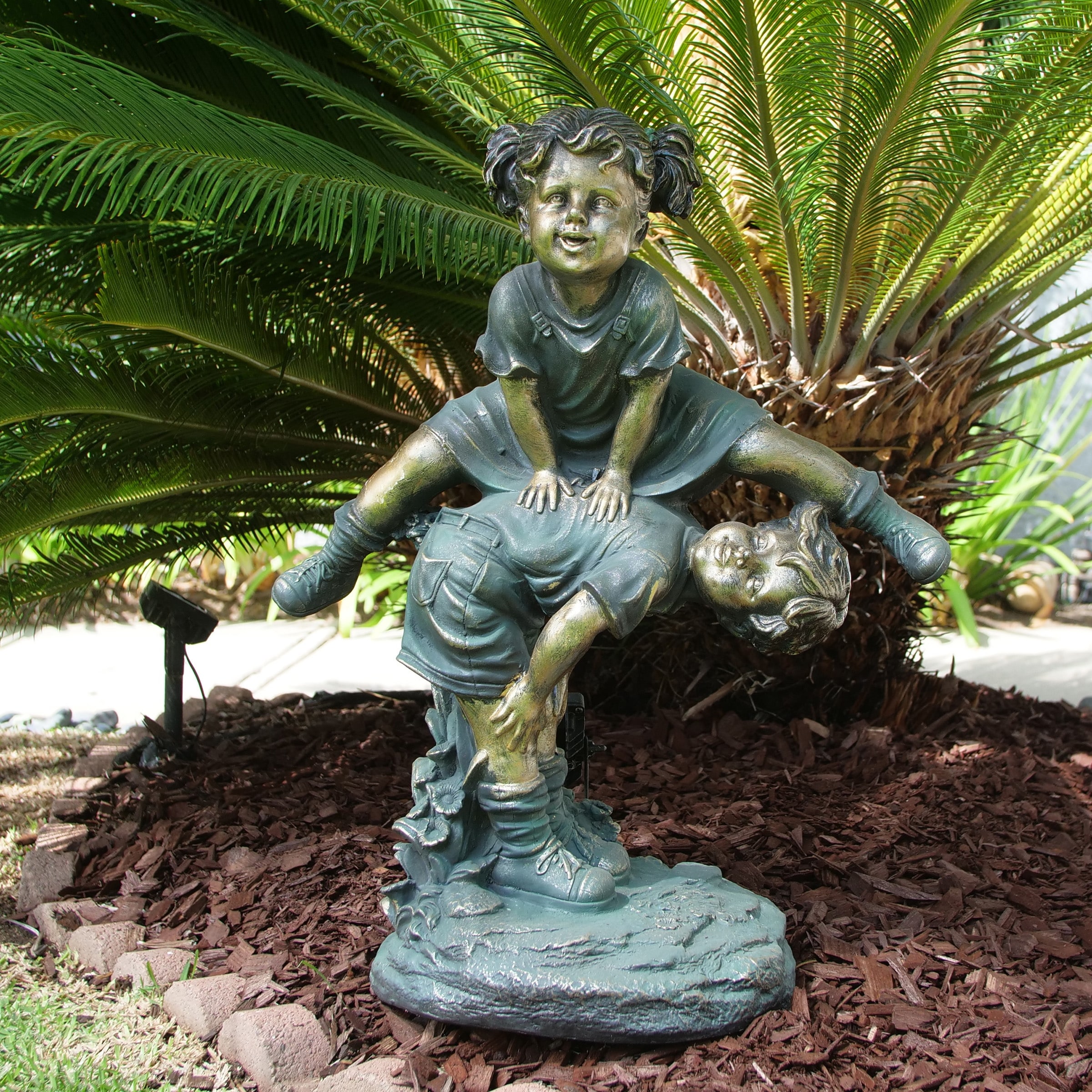 Alpine Corporation 26" Tall Indoor/Outdoor Girl Jumping Over Boy Statue Yard Art Decoration