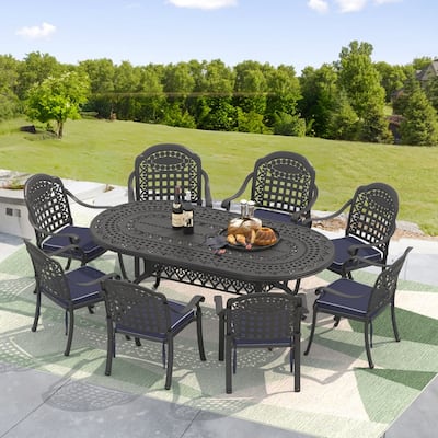 9-Piece Cast Aluminum Outdoor Dining Set with Blue Seat Cushions