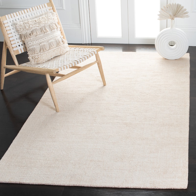 SAFAVIEH Handmade Natural Fiber Najiba Casual Jute Rug - 5' x 8' - Light Pink