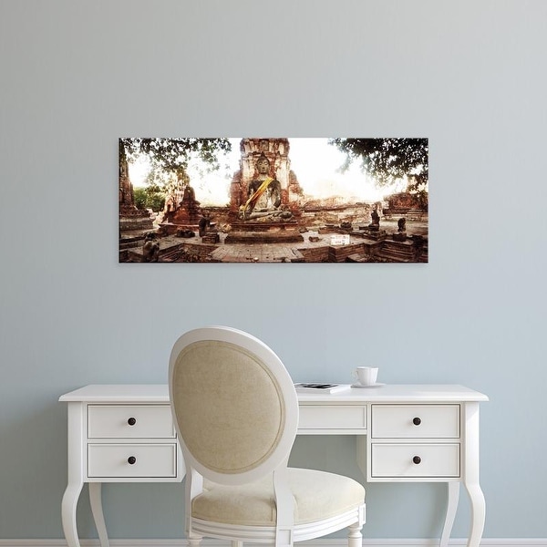 Easy Art Prints Panoramic Image 'Buddha statue, cloth and flowers, Ancient ruins of Ayutthaya, Thailand' Canvas Art
