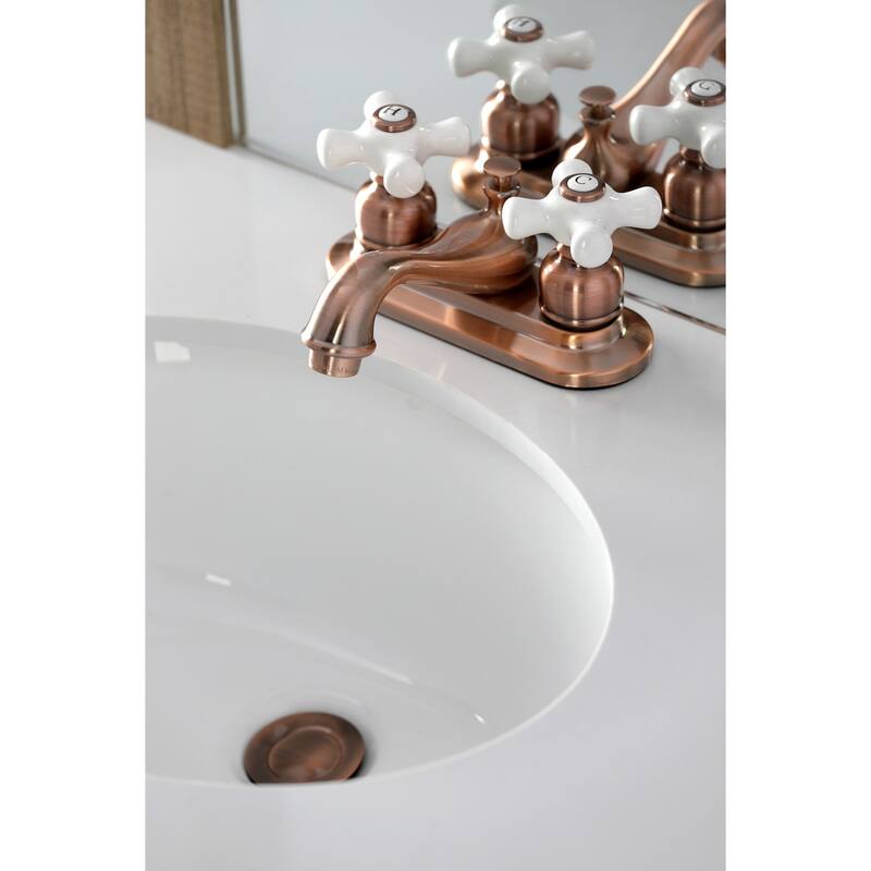 Kingston Brass Restoration Two-Handle 3-Hole Deck Mount 4 in. Centerset Bathroom Faucet