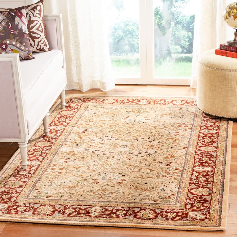 SAFAVIEH Handmade Persian Legend Lotte Traditional Oriental Wool Rug - 4' x 6' - Ivory/Rust