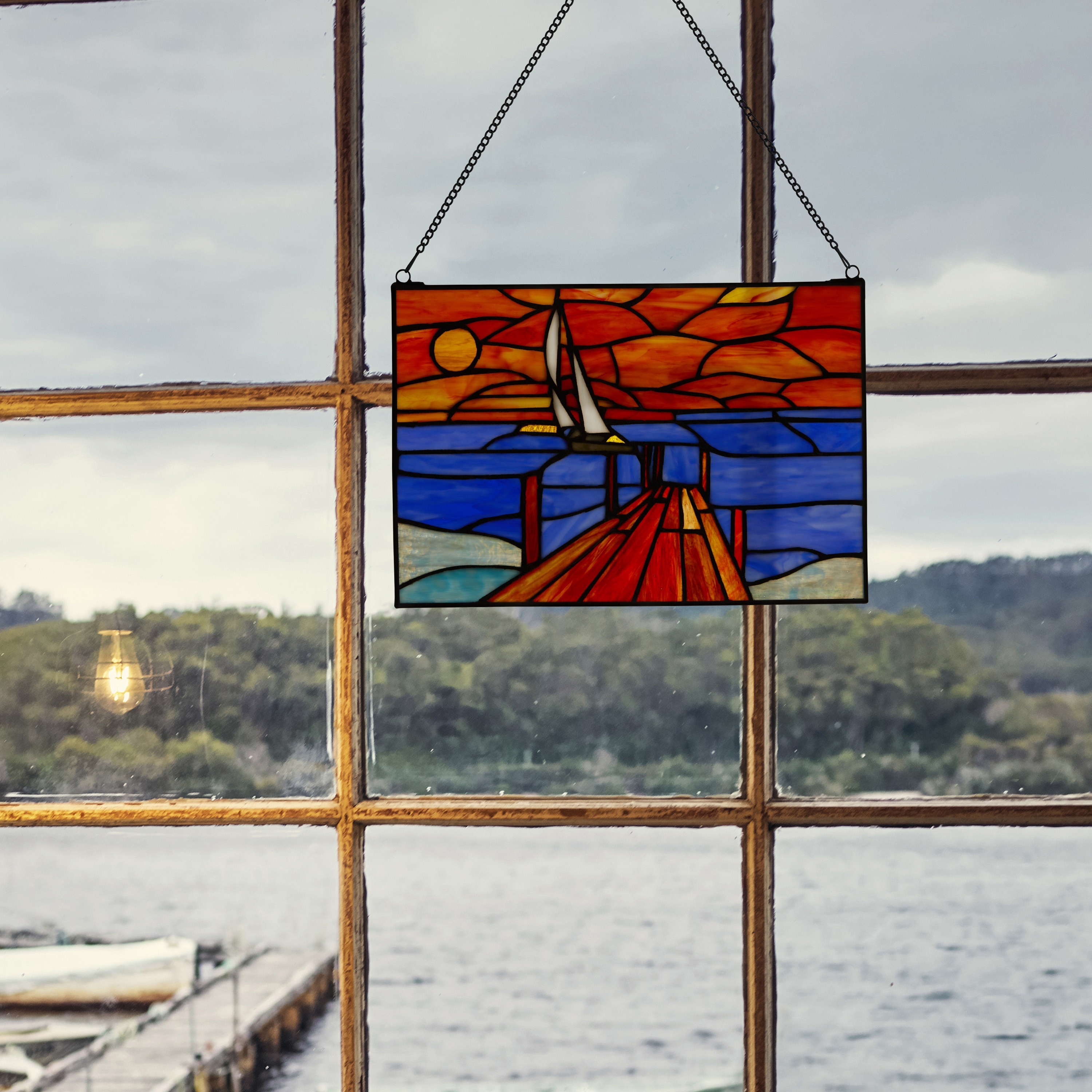 River of Goods Sailboat at Sunset Tiffany-Style Stained Glass Window Panel - 14" x 0.25" x 9.5"