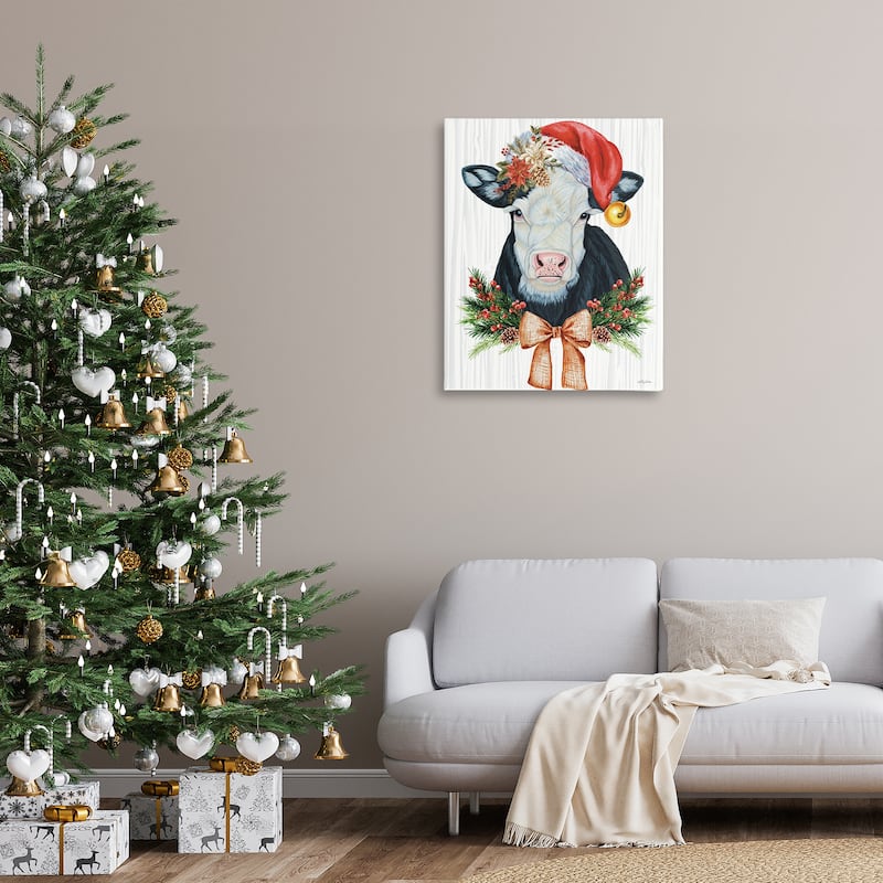 Stupell Festive Cow in Christmas Hat Canvas Wall Art Design By Ashley Justice