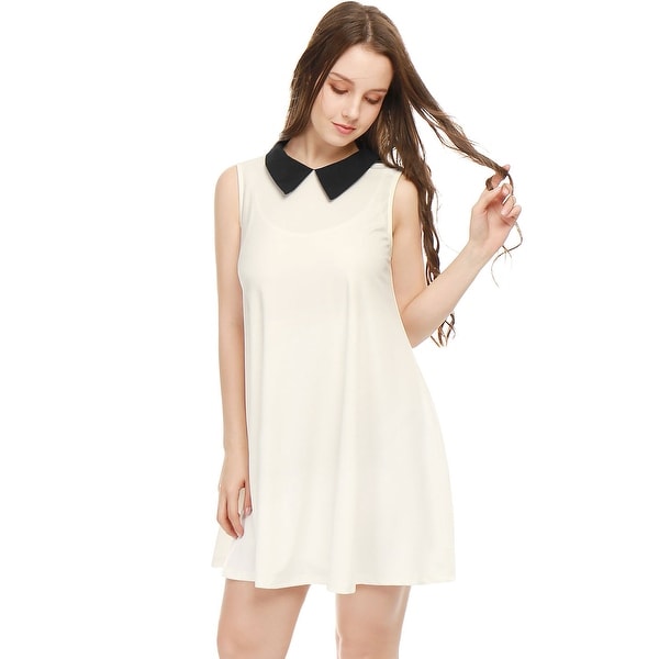 white sleeveless swing dress