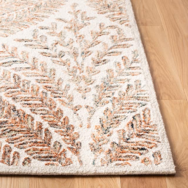 SAFAVIEH Handmade Capri Ilianka Wool Rug