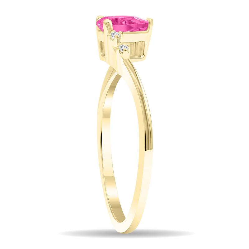 Women's Pear Shaped Pink Topaz and Diamond Wave Ring in 10K Yellow Gold