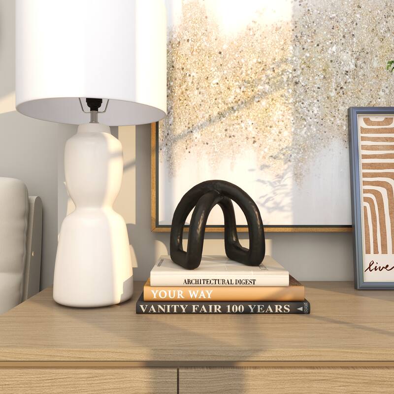 CosmoLiving by Cosmopolitan Black Porcelain Ceramic Arched Abstract Decorative Sculpture