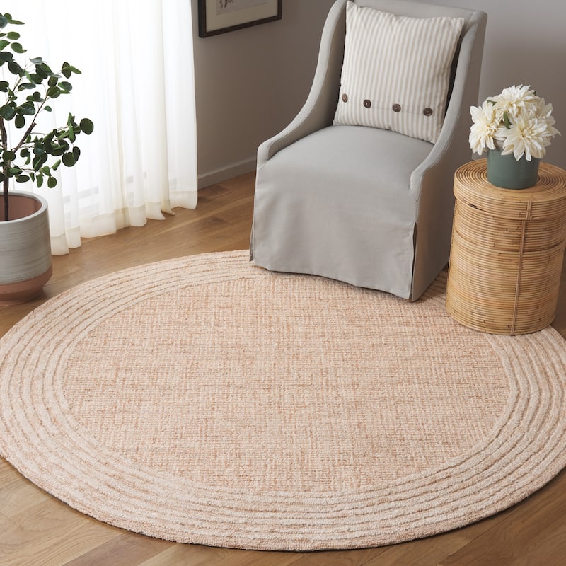 SAFAVIEH Handmade Ebony Dorith Border Wool Rug - 6' Round - Ivory/Pink