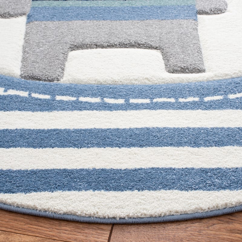 SAFAVIEH Carousel Kids Basimah Stripe Dog Rug