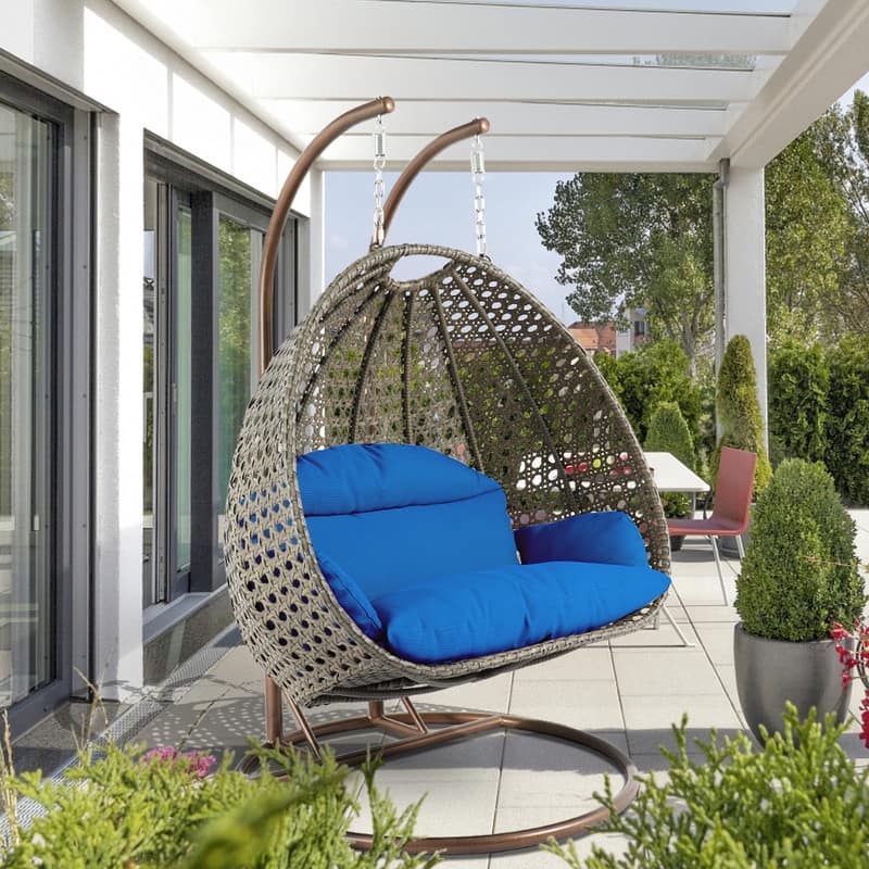 LeisureMod 2-Person Hanging Egg Swing Chair - Beige Wicker Patio Hammock with Oxford Fabric Cover & Cushions - Double Lounger