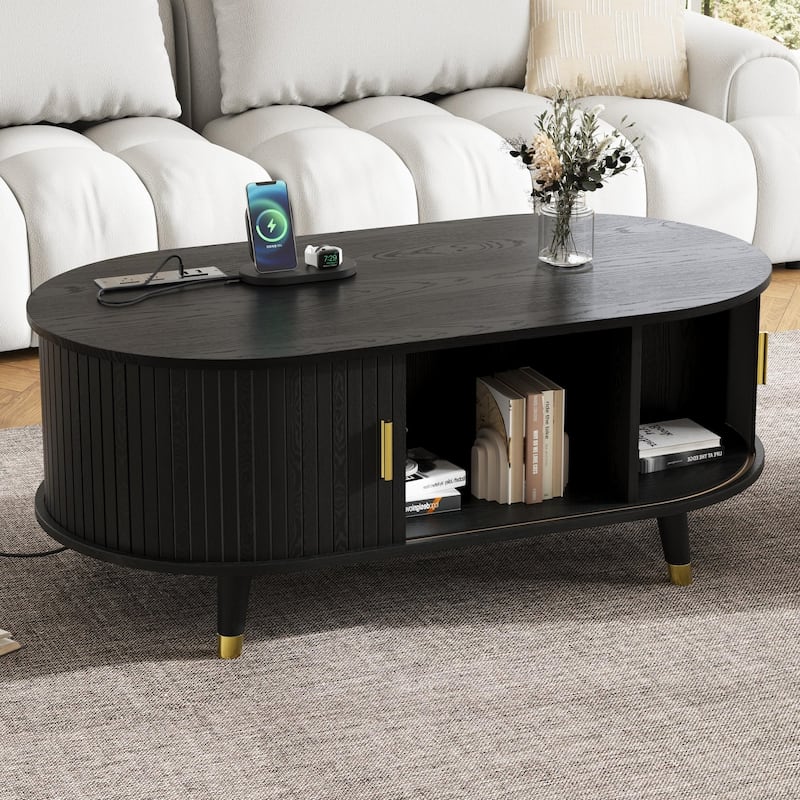 42.5" Mid-Century Oval Coffee Table – Solid Wood Fluted Design with Sliding Tambour Door & Built-In Charging Station.