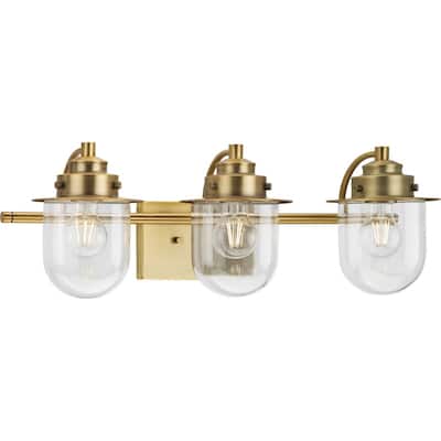 Northlake Collection Three-Light Vintage Brass Clear Glass Transitional Bath Light - 24 in x 7.5 in x 8 in
