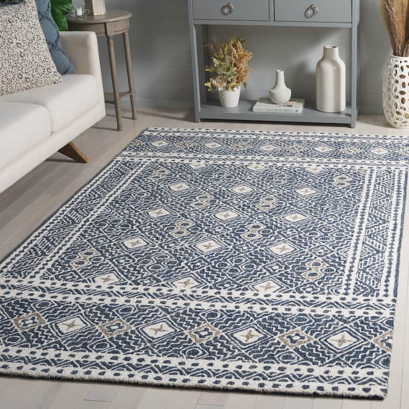 SAFAVIEH Handmade Micro-Loop Jelske Wool Rug