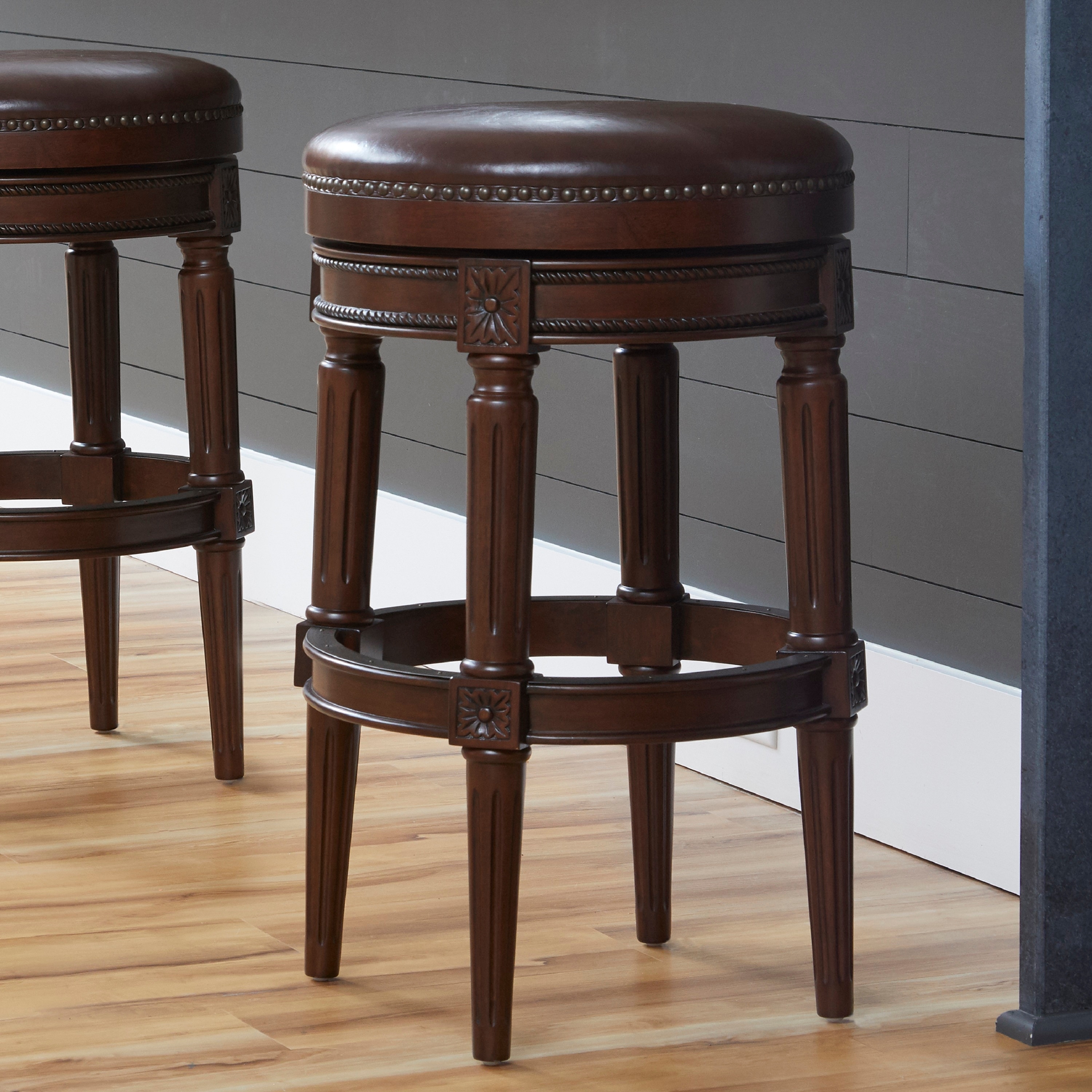 Classic 31" Swivel Upholstered Barstool, Wood Frame, 360° Faux Leather Seat, Nailhead Trim & Foorests by GDFStudio