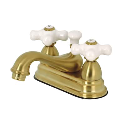 Kingston Brass Restoration Two-Handle 3-Hole Deck Mount 4 in. Centerset Bathroom Faucet