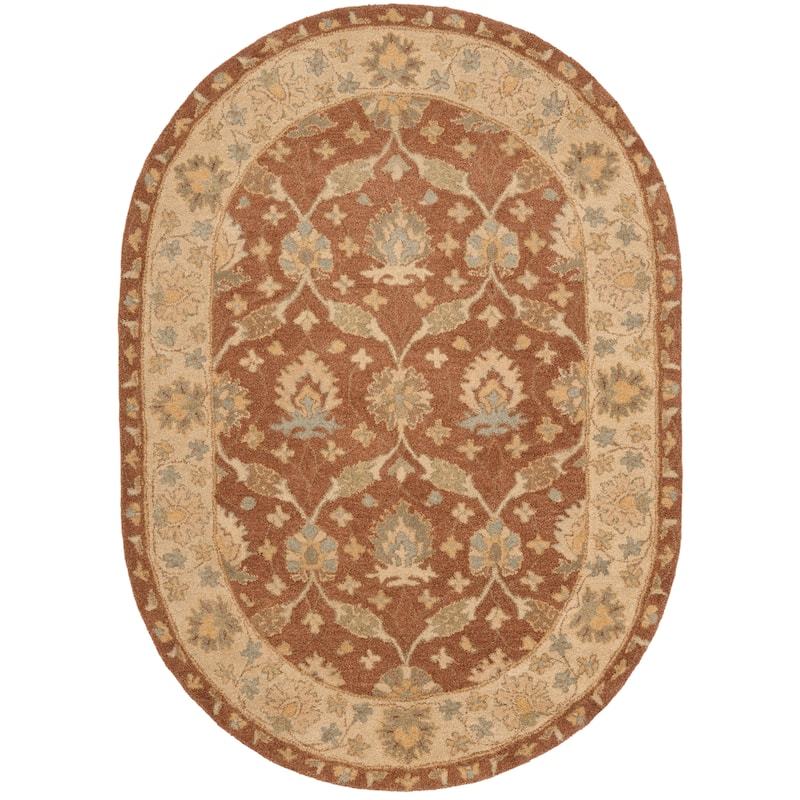 SAFAVIEH Handmade Antiquity Gigja Traditional Oriental Wool Rug - 7'6" x 9'6" Oval - Brown/Taupe