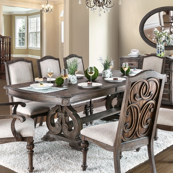 Brown table with store gray chairs