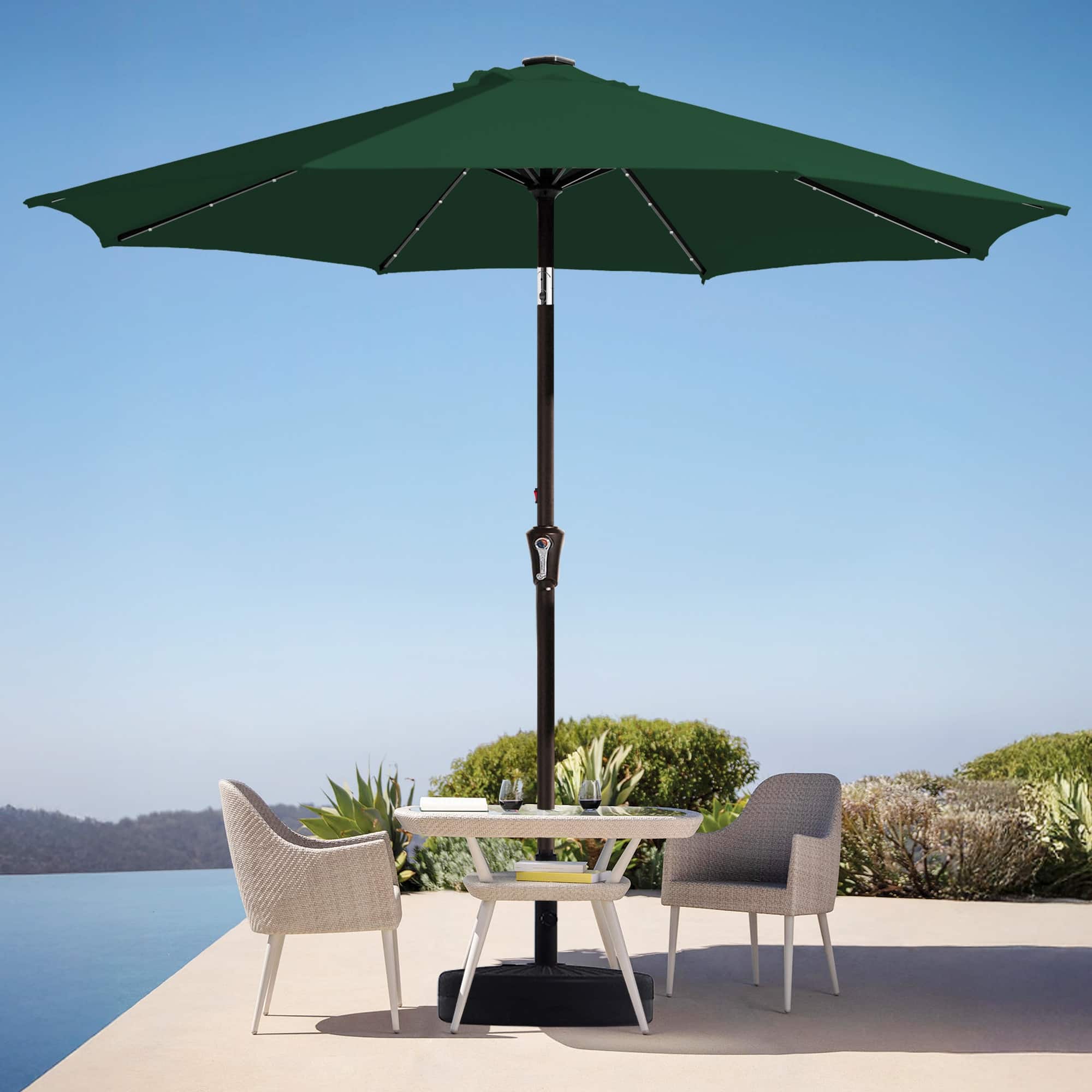 dark green 9 ft patio umbrella with led lights Leigh Country TX 94132 9' Solar Powered creating a cozy and inviting ambiance for evening gatherings Blissun 9 ft Solar Umbrella,