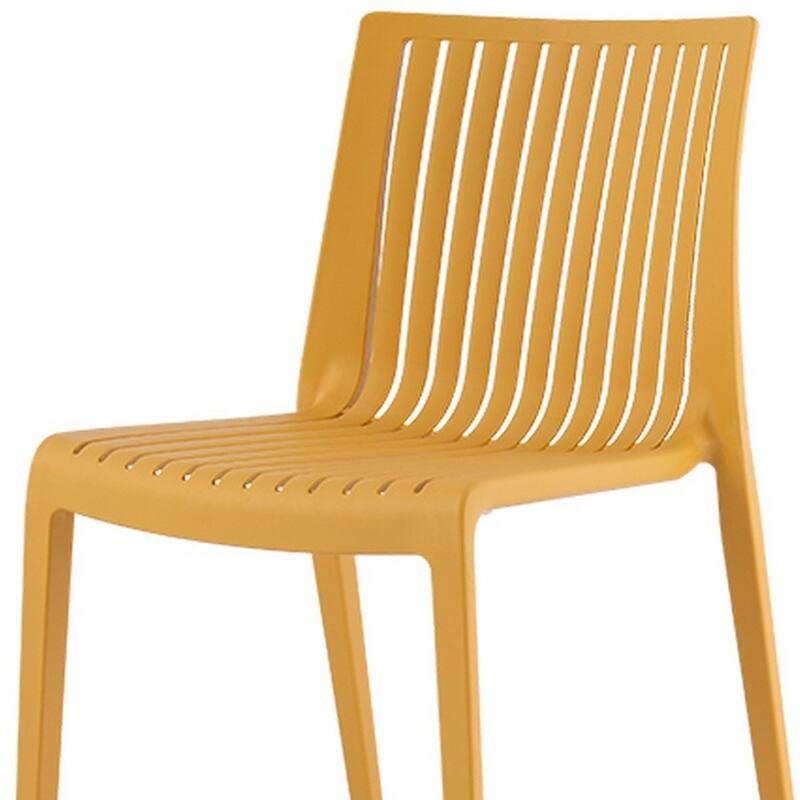 HomeRoots Set of Two Gold Heavy Duty Plastic Outdoor Stacking Accent Chairs